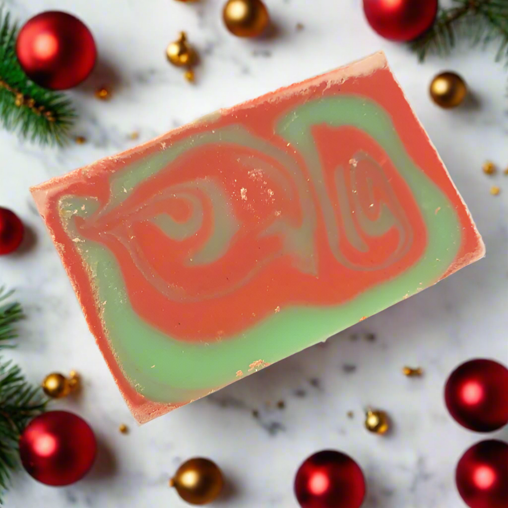 A bar of soap surrounded by Christmas decorations